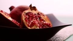 Black food plates fruits pomegranate