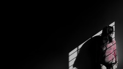 Black red woman black background