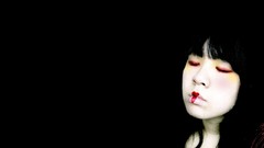 Black red woman Japanese lips black background faces asians 