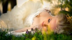 Blondes woman grass blurred