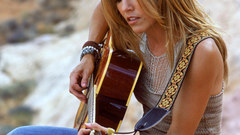 Blondes woman jeans guitars