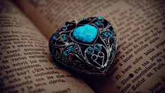 Blue abstract Books Hearts Jewelry pendant out of focus