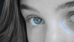 Blue black and white eyes woman
