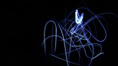 Blue dark light flash shapes light trails