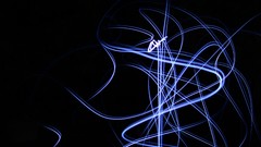 Blue dark light flash shapes light trails