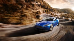 Blue Mountains clouds cars turn Aston Martin roads sunny 