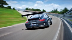 Blue Porsche cars turn