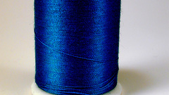 Blue spool thread Space