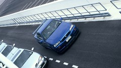 Blue track cars front Nissan vehicles front angle view Nissan 