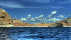 Blue water hills sky