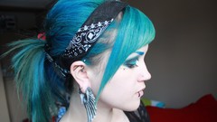 Blue woman blue hair piercings