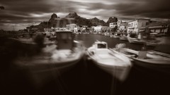 Boats sepia buildings motion blur