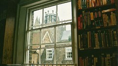 Books bookshelf window panes