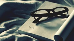 Books glasses Arabic