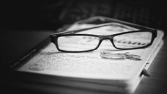 Books glasses grayscale