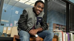 Books jeans watches smiling community Donald Glover