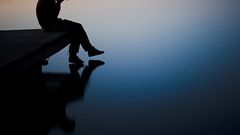 Boy alone Lake evening