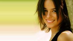 Brunettes Alizée smiling faces
