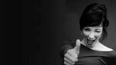 Brunettes monochrome thumbs up