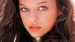 Brunettes woman close-up blue