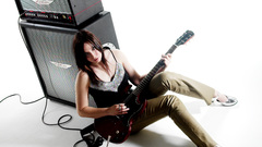 Brunettes woman guitars amplifiers