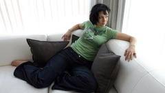 Brunettes woman jeans barefoot