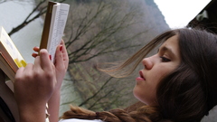 Brunettes woman reading Books