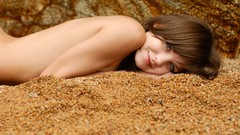 Brunettes woman sand smiling