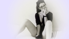 Brunettes woman smoking glasses