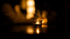 Candles monochrome bokeh blurred background tealight