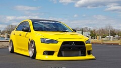 Car Mitsubishi Lancer Evo X vehicle yellow cars Mitsubishi