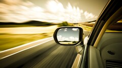 Car motion blur mirror long exposure vehicle road reflection
