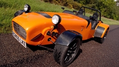 Car orange vehicle orange cars Caterham Super Seven outdoors