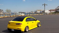 Car yellow cars Mitsubishi Lancer Evo X Harbor vehicle