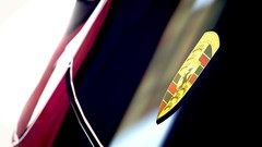 Cars close-up Porsche logos