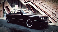 Cars contrast urban vehicles BMW E30 German cars