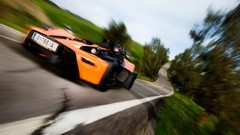 Cars ride roads front