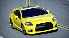 Cars turn Mitsubishi roads corner vehicles front angle view 