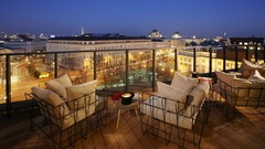 Chairs balcony City Lights architecture buildings cityscapes 