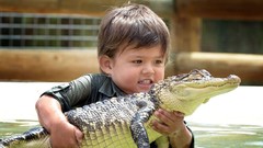 Children baby animals alligators