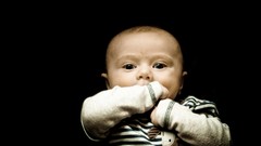 Children baby black background