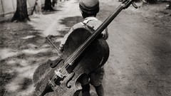 Children cello monochrome gypsy old photography Eva Besnyö