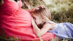 Children little kissing pregnant