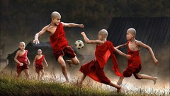 Children Monks playing soccer