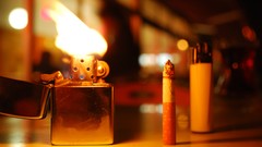 Cigarettes bokeh flames lighters blurred background
