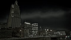 cityscape dark street clouds building night sky lights urban