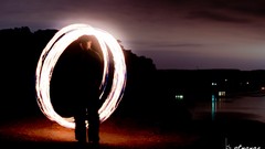 Cliffs long exposure bstrange fire spinning poi