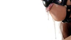 Close-up BDSM drool spit