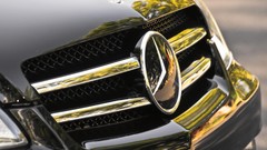 Close-up brands logos CLS Mercedes-Benz CLS-Class