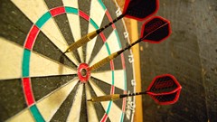 Close-up darts front angle view dartboard
